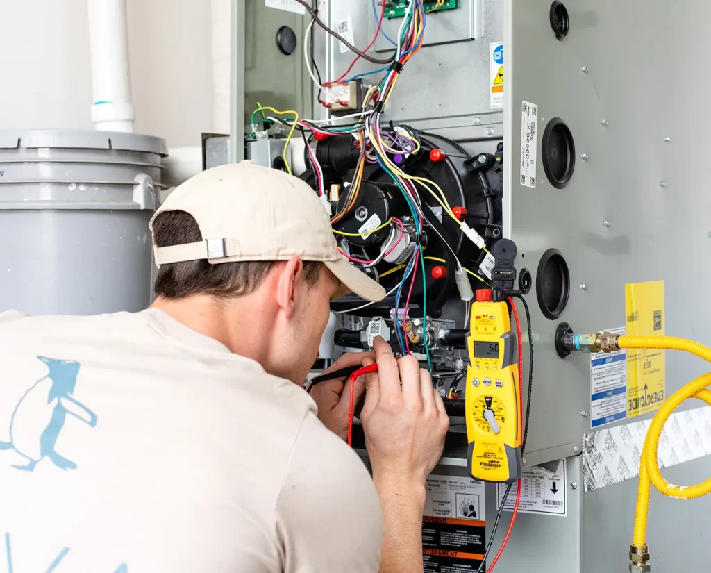 HVAC energy bills system efficiency inspection by Kova Heating technician